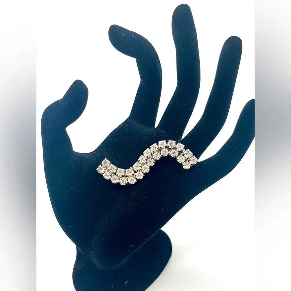 Vintage rhinestone wave brooch silver tone mid century